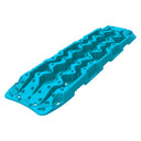 An ARB Aqua TREDHDAQ, a blue plastic tray designed for off-roading enthusiasts, featuring holes on it for enhanced traction and recovery.