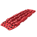 An ARB TRED Pro Recovery Boards TREDPROR - Red plastic mat with traction holes on it.