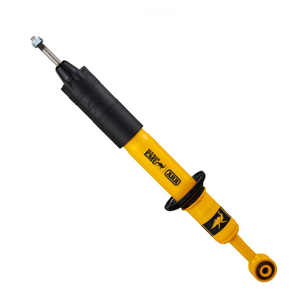 An Old Man Emu Front Nitrocharger Sport Strut 90016 for Toyota Prado 150 Series SWB with compression valving on a white background.