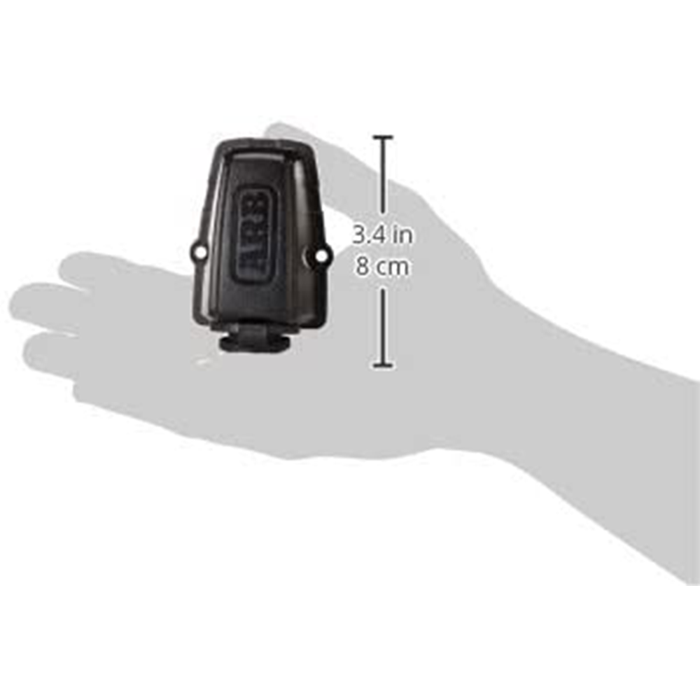 A hand holding an ARB Threaded Socket Surface Mount Outlet for ARB Fridge 10900028, a high quality black device.