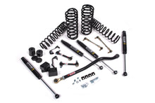 Load image into Gallery viewer, A JKS suspension kit for a jeep with coil springs and a sway bar.