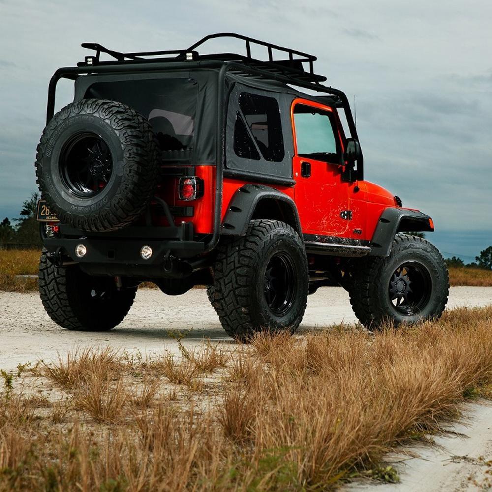 An orange jeep parked on a dirt road, with an ARB RD105 Air Locker Differential Dana 35 with 30 Splines.