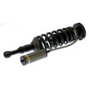 An OME BP-51 Coil Over Front BP5160021 for Jeep Wrangler JK Old Man Emu shock absorber with a remote reservoir and a spring on it.