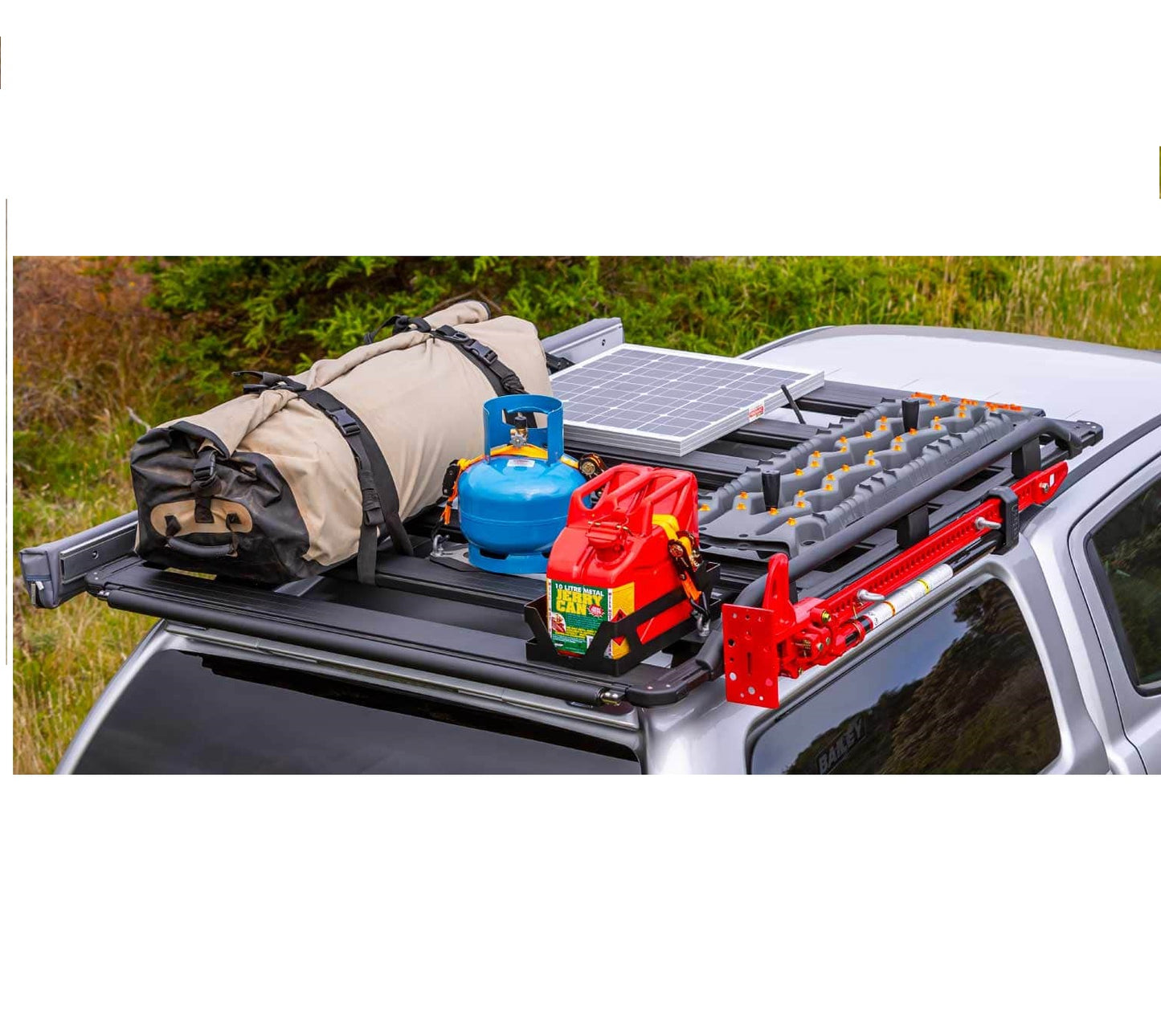 The ARB Base Rack (55" x 56") 1770070, equipped with extruded aluminum beams and a dovetail system, is designed to hold a lot of equipment on the roof of a car.