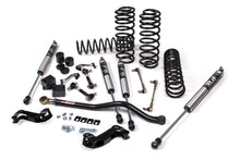 Load image into Gallery viewer, A JKS 2.5 Inch Jeep Wrangler JL (18-ON) 4 Door J-Kontrol Lift Kit, including springs and dampers, as a suspension system for a jeep with offroad articulation.