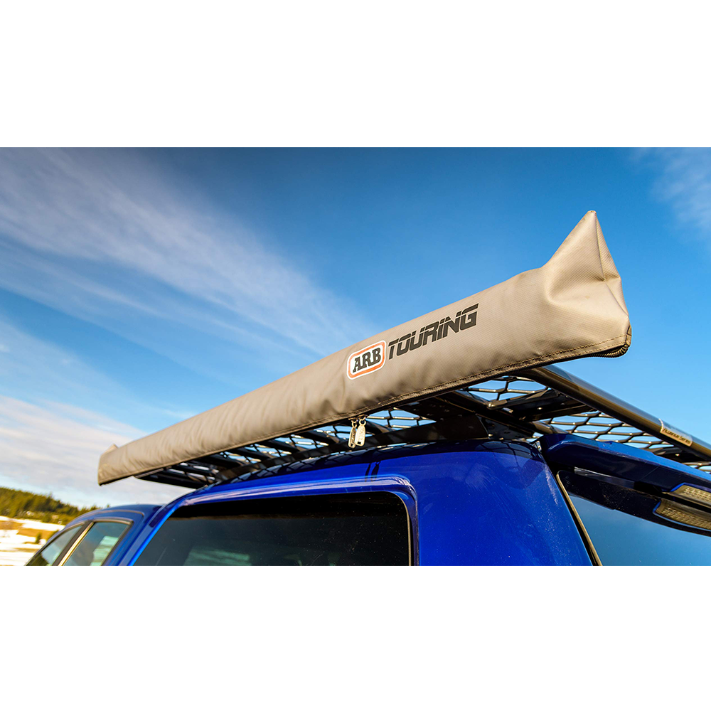 A blue car with a roof rack on top, featuring the ARB Touring 3 Wall Set No Floor 813206.