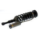 A black OME BP-51 Front LH Coilover BP5190007L for Toyota Hilux 2015-ON Old Man Emu coil spring with a shock absorber body attached to it.