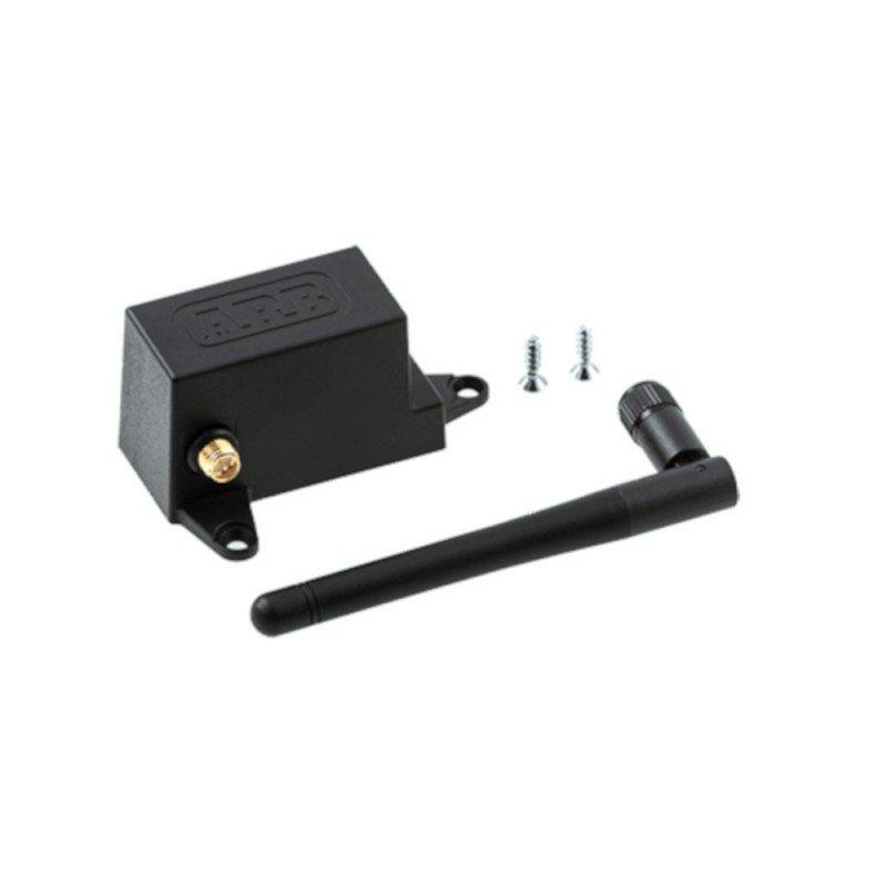 A black box with two screws and a wire, perfect for the ARB Classic Series II Fridge Freezer App Connect Module.