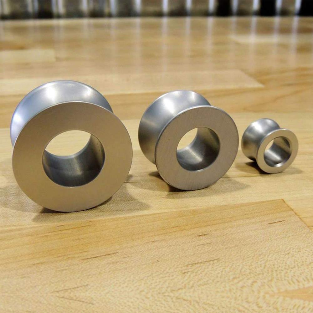 A wooden table with stainless steel bushings, providing corrosion protection and allowing for the use of a Factor 55 Synthetic Rope Spool 00096 on the load spool.