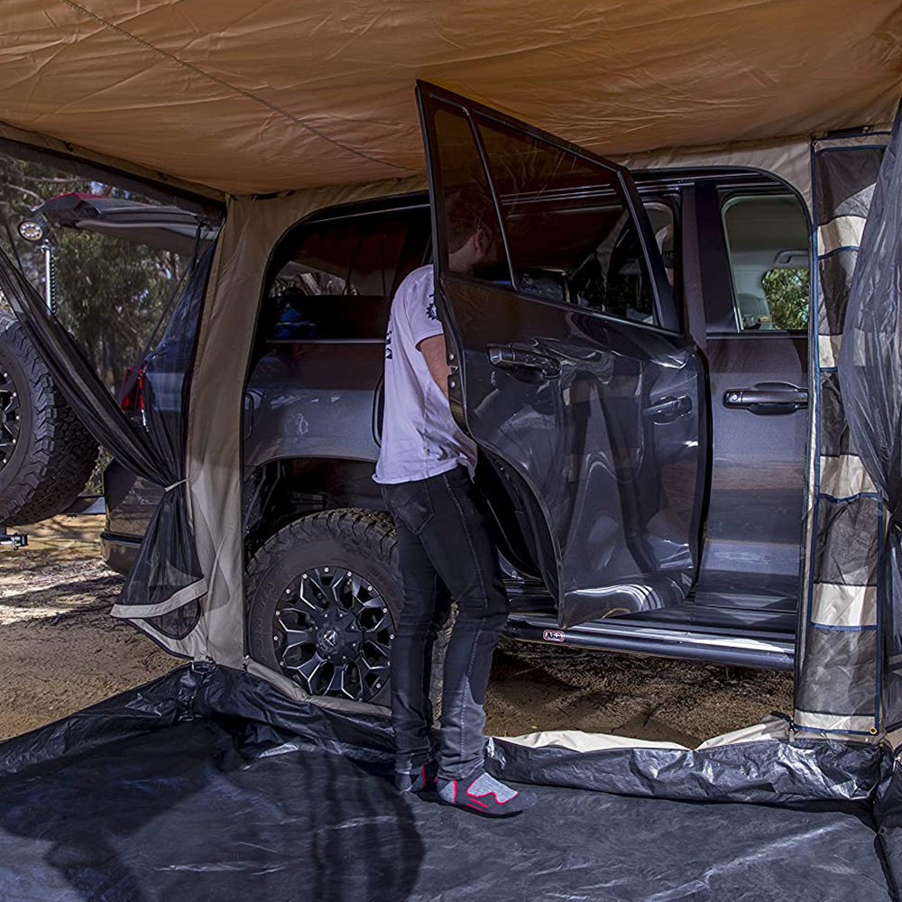 ARB Deluxe Awning Room With Floor 813108A and ARB Tacoma with Weather Protection.