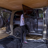 ARB Deluxe Awning Room With Floor 813108A and ARB Tacoma with Weather Protection.