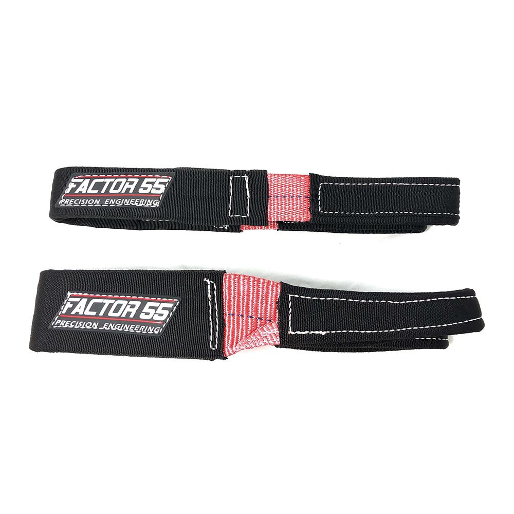 A pair of Factor 55 Shorty Strap III 3'' x 3'' 00079 black and red shorty straps on a white background.