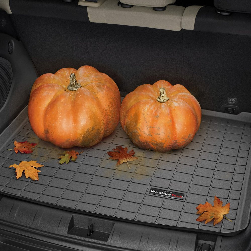 Two Weathertech Cargo Liners for Toyota 4Runner (2003-2009) protected in the trunk of a car.