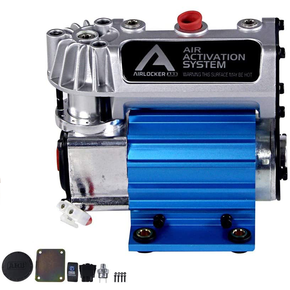 A blue ARB Air Locker Activation Compressor System CKSA12 with hoses and accessories, sealed for moisture and dust resistance.