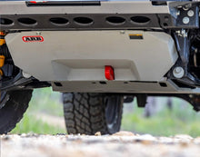 Load image into Gallery viewer, The rear bumper of a Toyota Prado featuring ARB Under Vehicle Skid Plates System with kinetic (KDSS) 5421110 and other ARB products.