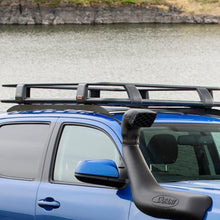 Load image into Gallery viewer, ARB Steel Roof Rack System for Jeep Wrangler 2018-2020 3813030KJL for cargo transportation.