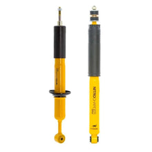 Load image into Gallery viewer, A pair of yellow ARB Old Man Emu Rear Nitrocharger Sport 60004 shock absorbers designed for heavy loads, providing excellent shock absorber performance with compression valving on a white background.