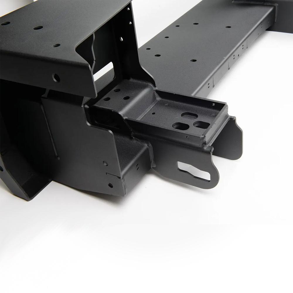 A secure Sahara Style Modular Winch Bumper Kit ARB 2236020 mounting points bracket for a vehicle, featuring a sleek black metal wing design.