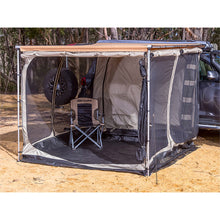Load image into Gallery viewer, An ARB Deluxe Awning Room with Floor 813208A camping tent with insect protection and weather protection.