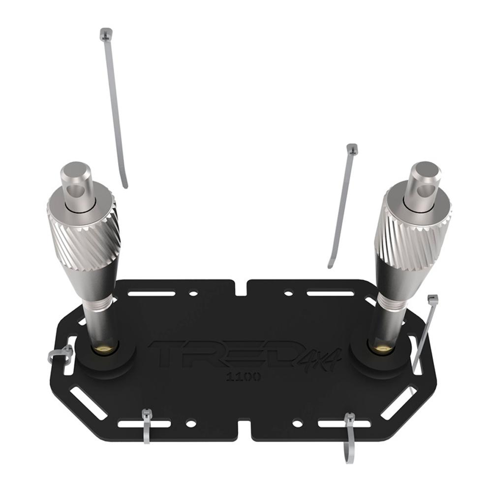 A black plate with two screws on it, designed for mounting brackets, specifically for the ARB TRED Pro Ratchet Handle TPMKRH by ARB.