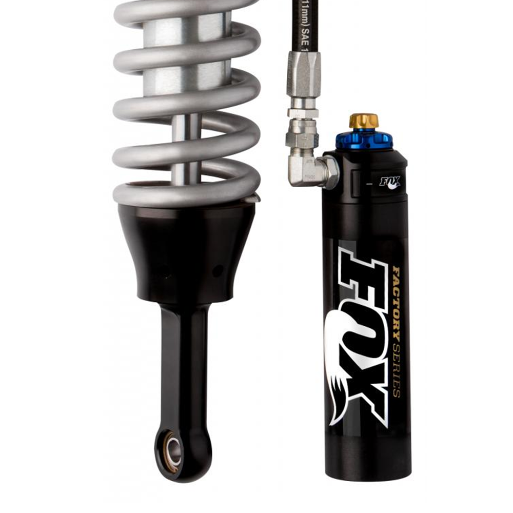 Fox Racing shocks and springs with a long lasting finish on a white background.