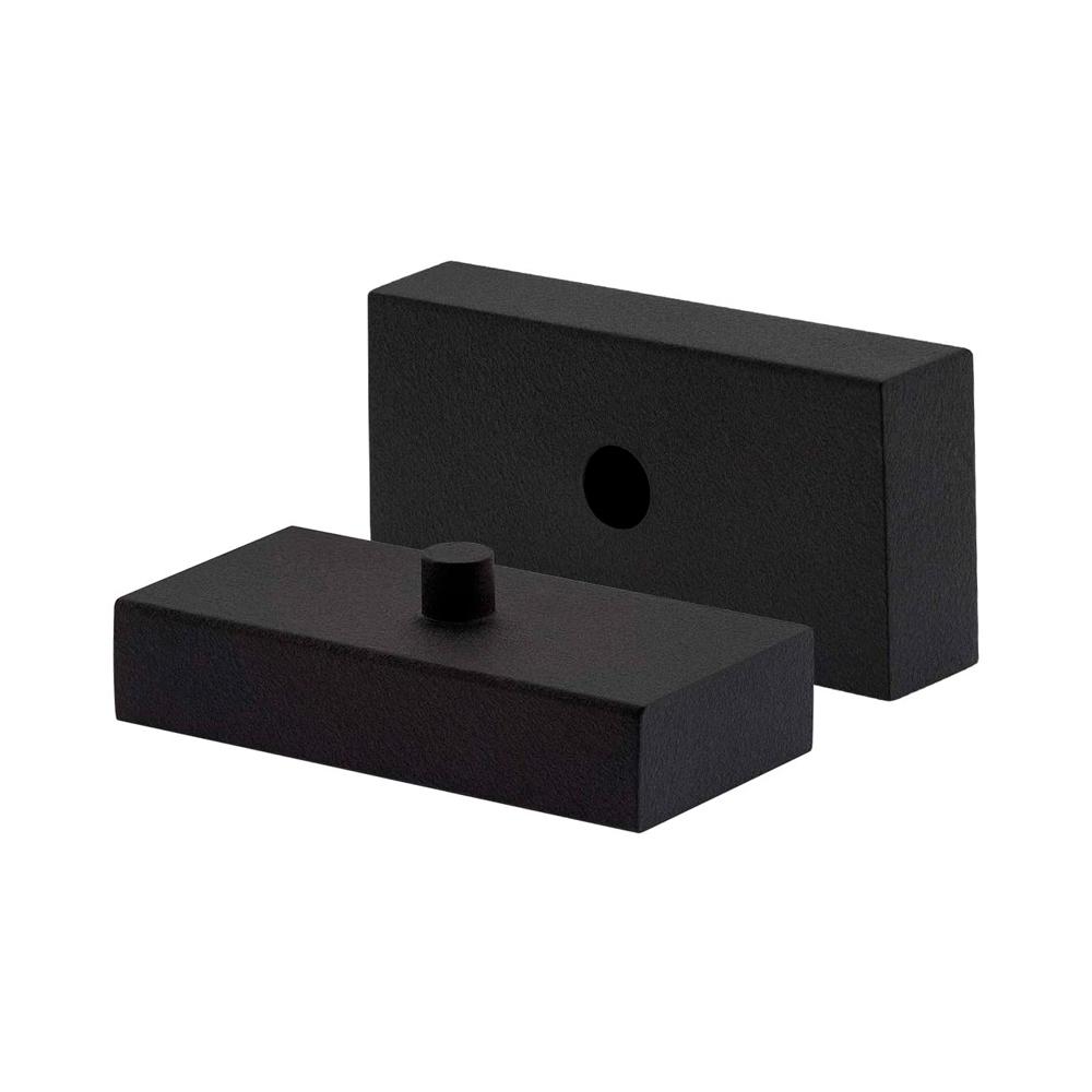 A pair of Old Man Emu Leaf Spring Spacer 3460023 black plastic boxes with a load capacity on a white background.