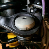 A close up of a Old Man Emu motorcycle tire with a wheel alignment.