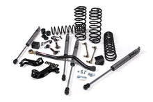 Load image into Gallery viewer, A JKS suspension kit for a Jeep Wrangler JL (18-ON) 2 Door with coil springs and a J-Kontrol suspension system.