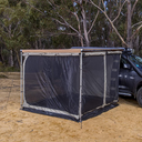 A car is parked next to a tent with ARB Deluxe Awning Room With Floor 813108A for weather protection.