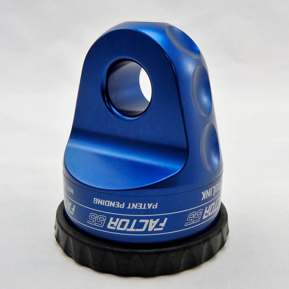 A Factor 55 Shackle Mount in Blue 00015-02 handlebar clamp on a white surface, secured with screw pin shackles.