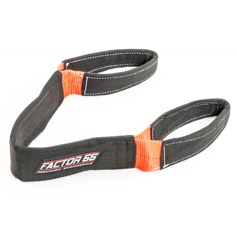 A Factor 55 Shorty Strap II 00078, a black and orange recovery strap perfect for recoil situations.