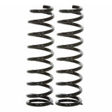A pair of Old Man Emu Rear Coil Springs 3049 for Toyota Landcruiser 80 & 105 Series (2.5 inch Lift - Constant Load 881lbs) on a white background, ensuring easy installation and enhancing ride height.