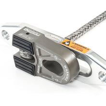 Load image into Gallery viewer, A Factor 55 FlatLink E (EXPERT) Shackle Mount - Gray 00080-06, a closed system winching device, featuring a metal strap with a rope attached to it.