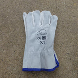 A pair of ARB Winching Gloves, made of synthetic leather, providing excellent protection on a concrete floor.