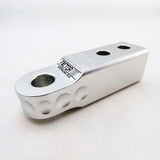 A Factor 55 HitchLink 2.0in Silver 00020-05 stainless steel bracket with a powder coated finish on a white surface.