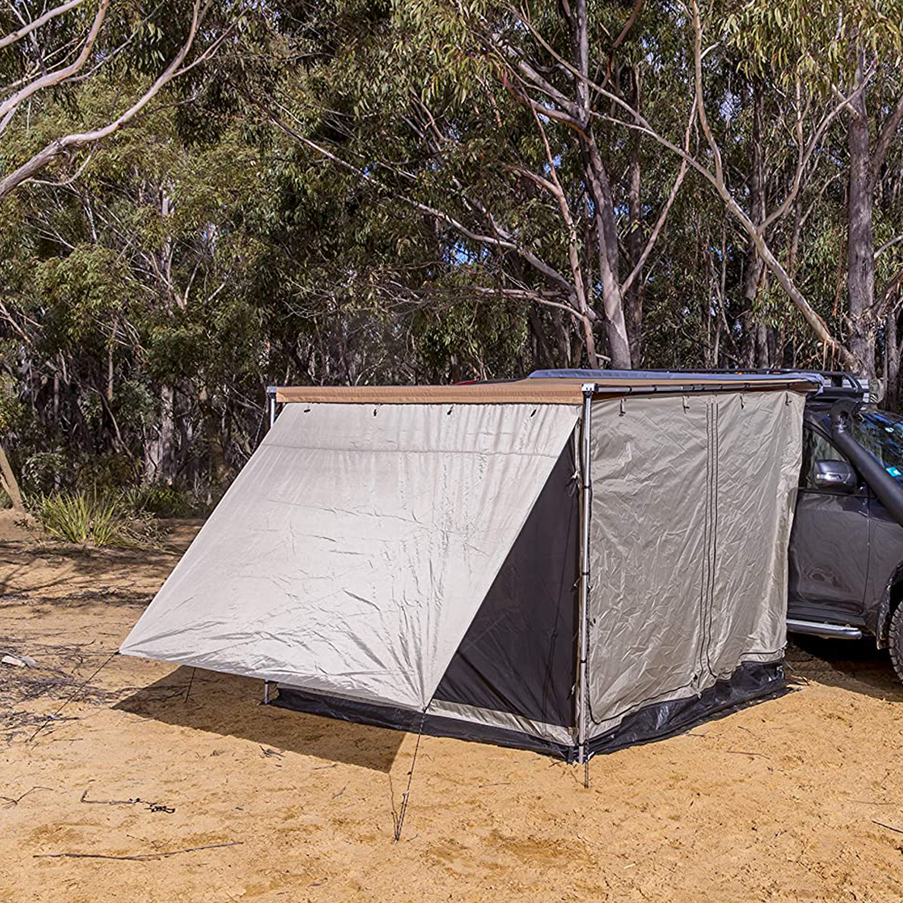 An ARB Deluxe Awning Room With Floor 813108A attached to it.